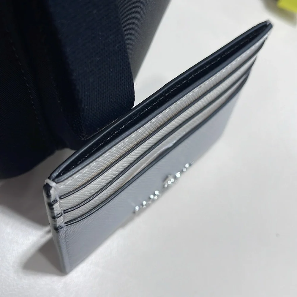 Kate Spade Madison Small Slim Card Holder
Platinum Grey Multi
NWT - Picture 15 of 16